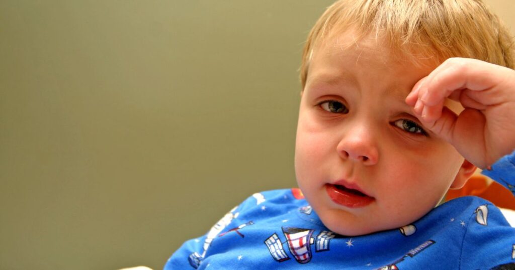 Sick child experiencing symptoms related to toxic mattress