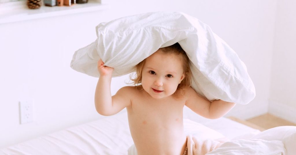 Baby with pillow