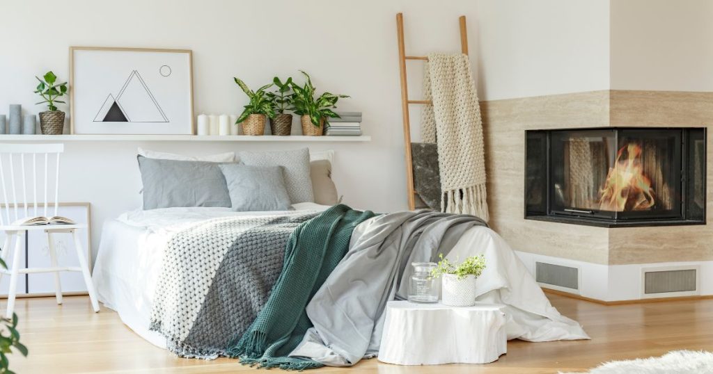 Cozy bedroom with with a fire place