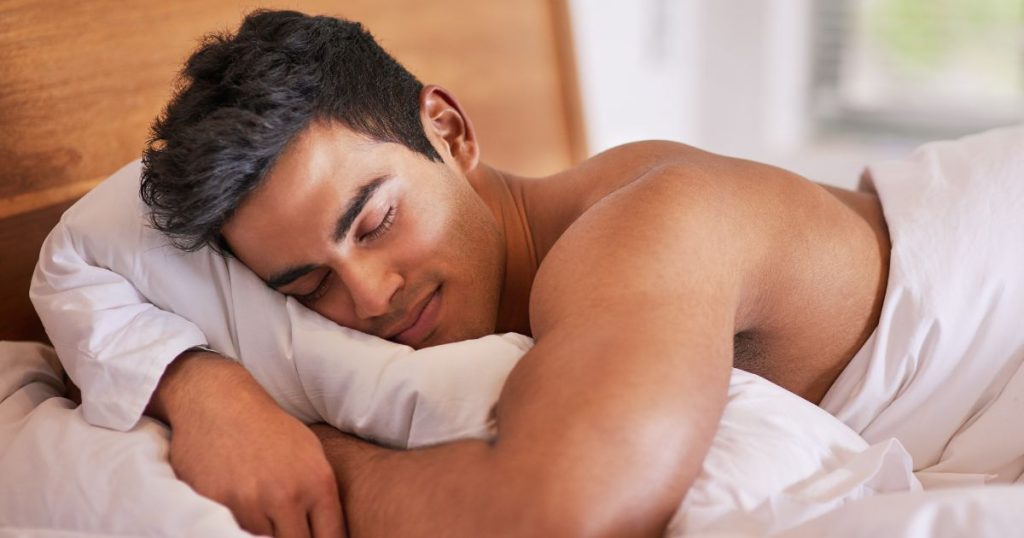 Man sleeping comfortably on his stomach