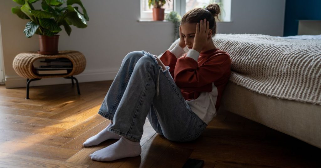 Girl experiencing anxiety because she experiences common sleep disorders in children