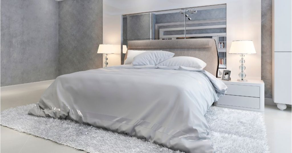 A super king size bed in a large bedroom