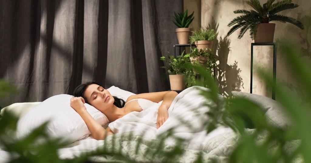Woman sleeping cool under a pure wool duvet