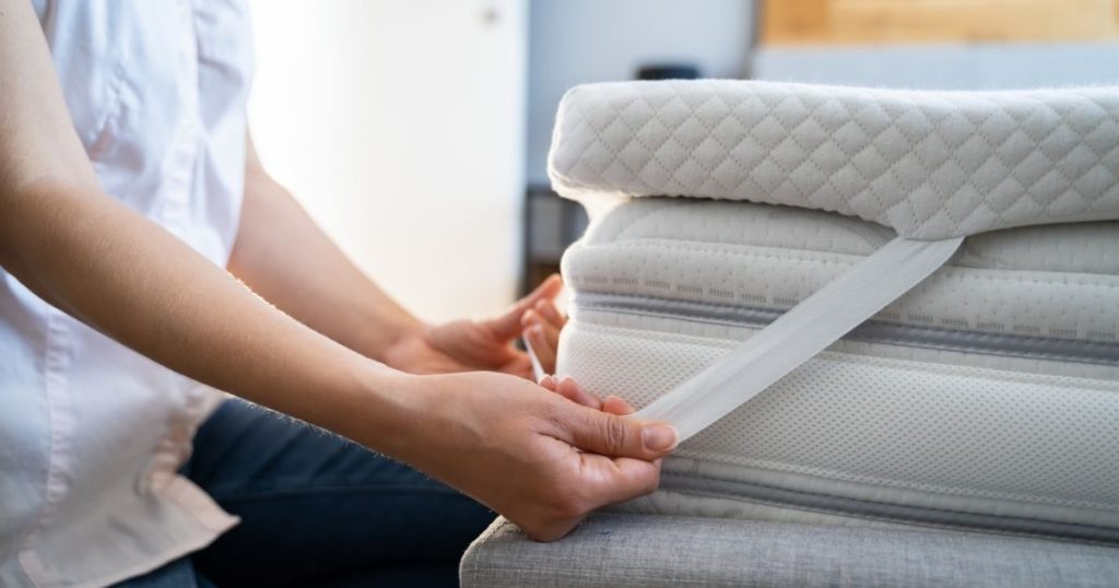 Mattress topper placesd on top of a mattress
